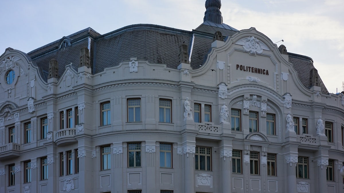 a large building with a clock on the top of it